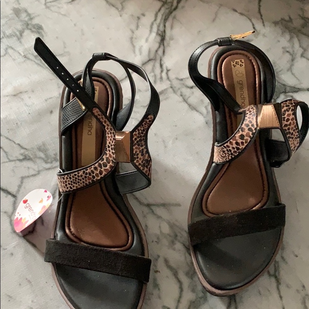 Brand new sandals with leopard print on strap